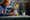 Image of the new LEGO Ideas Pixar Luxo Jr Display model and a man to the left handside building and looking at the model