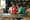 Couple building LEGO LOVE Sculpture